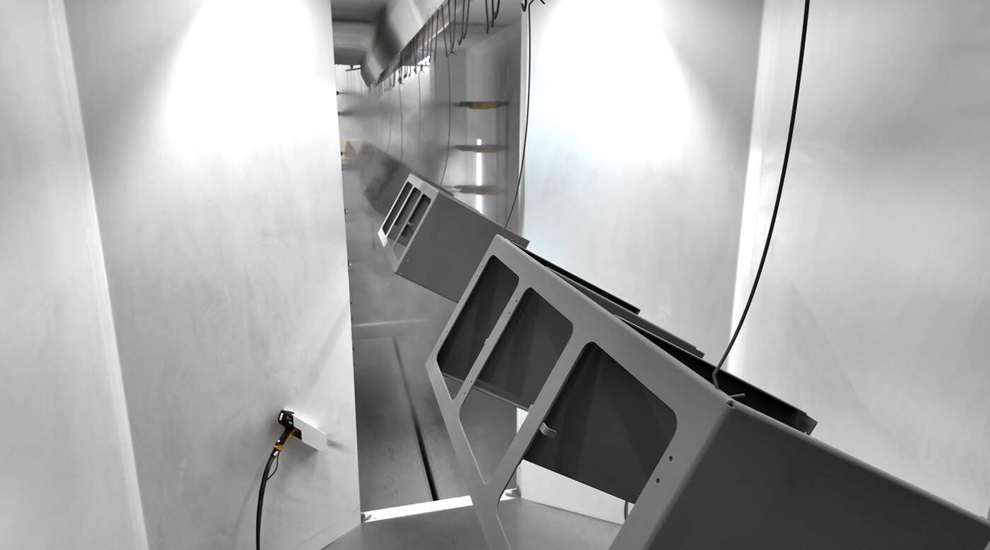 Powder Coating a part at Rock Run Industries